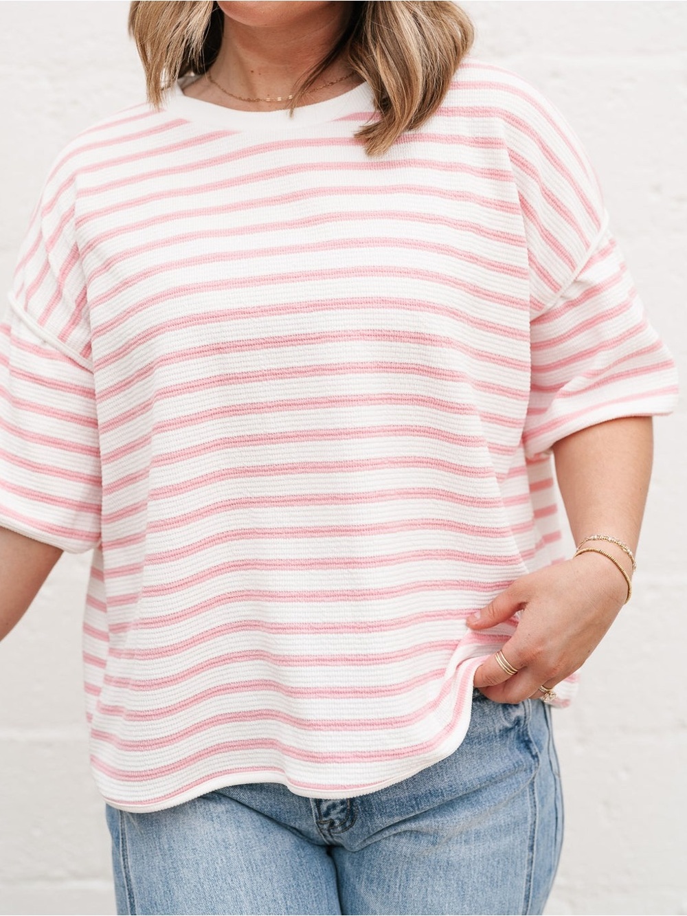 Pink and white striped knit top